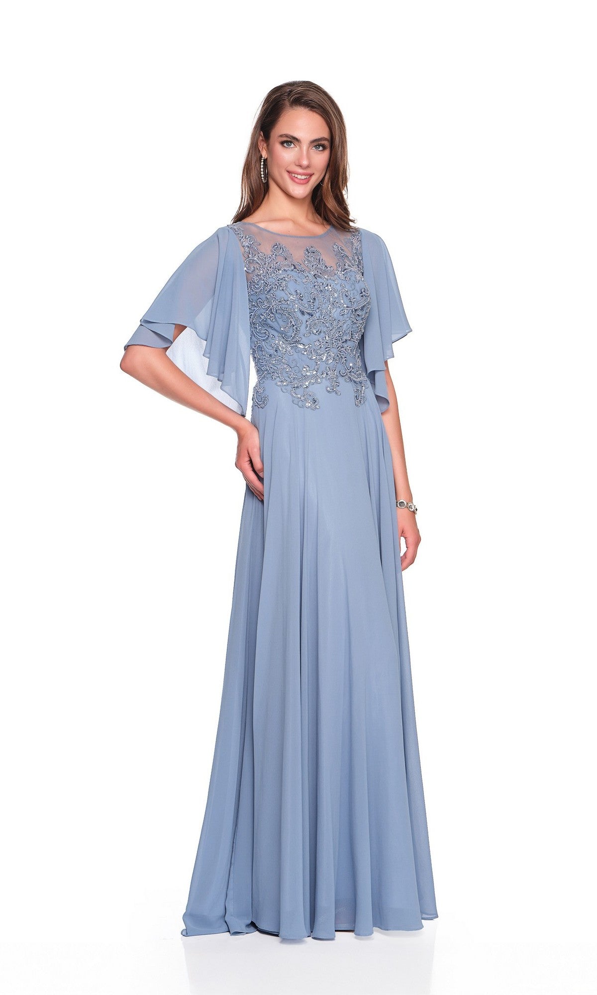 A woman wearing the Dave & Johnny Long Prom Dress 11676—a light blue, a-line gown with sheer flutter sleeves and floral embroidery on the bodice—stands against a plain white background.